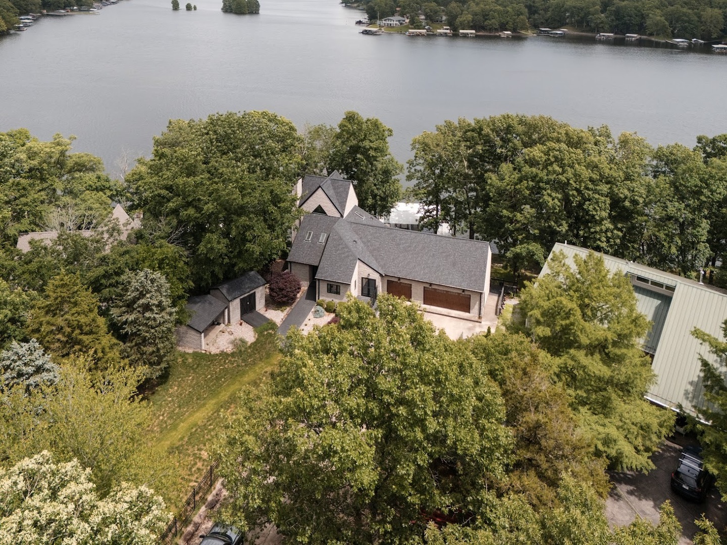 12225 Pebble Point Road Marion, IL 62959 - Photo 78 of 88 an aerial view of a house with a yard and lake view