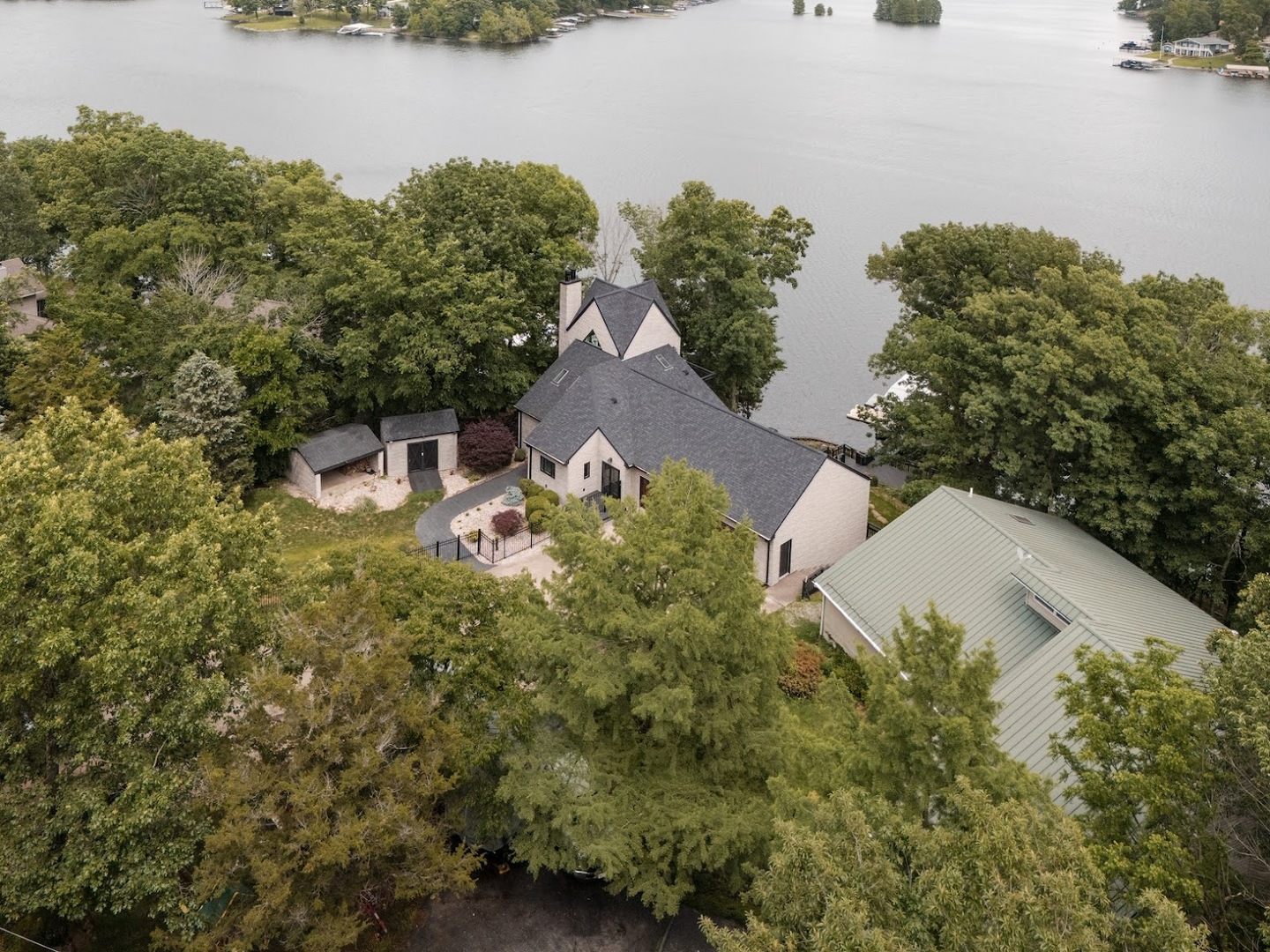 12225 Pebble Point Road Marion, IL 62959 - Photo 79 of 88 an aerial view of a house with outdoor space and lake view