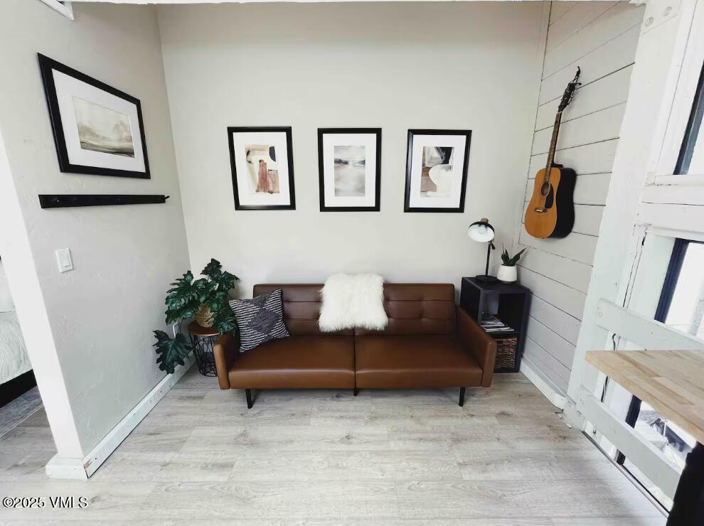 2958 South Frontage Road West, Unit B5 Vail, CO 81657 - Photo 10 of 13 a living room with furniture and a couch