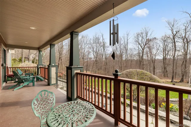 a view of balcony with furniture