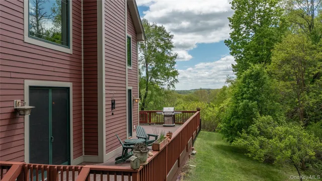 a backyard of a house with lots of green space