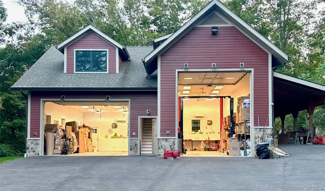 a view of brick house with large windows