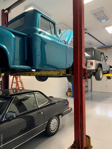 a car parked in front of a house