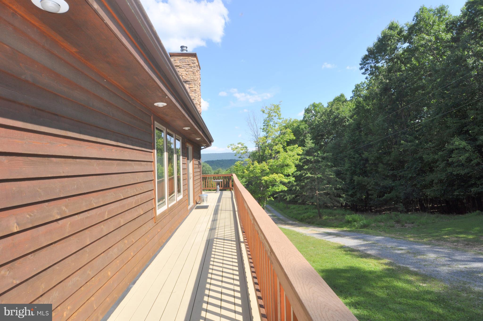 1352 Virginia Line-Potomac Road Berkeley Springs, WV 25411 - Photo 8 of 32 a view of balcony with seating space