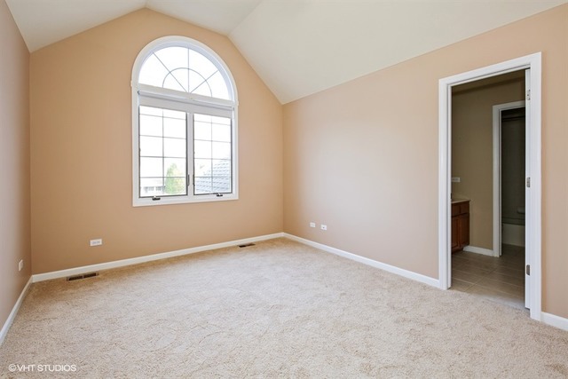 2309 Dean Street Sycamore, IL 60178 - Photo 16 of 25 an empty room with windows and closet