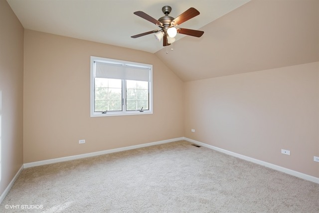 2309 Dean Street Sycamore, IL 60178 - Photo 19 of 25 an empty room with a window and a fan