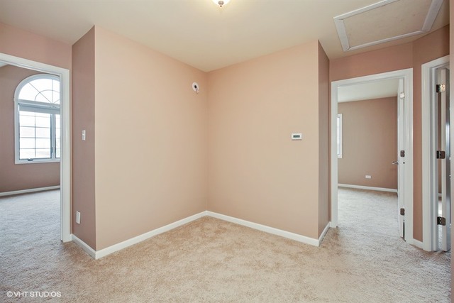 2309 Dean Street Sycamore, IL 60178 - Photo 21 of 25 an empty room with windows and closet