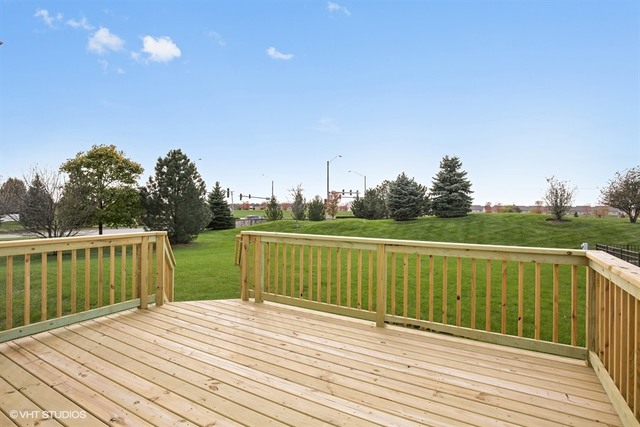2309 Dean Street Sycamore, IL 60178 - Photo 24 of 25 a view of a wooden deck with a yard