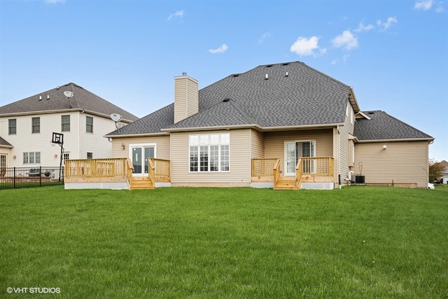 2309 Dean Street Sycamore, IL 60178 - Photo 25 of 25 a front view of a house with a garden