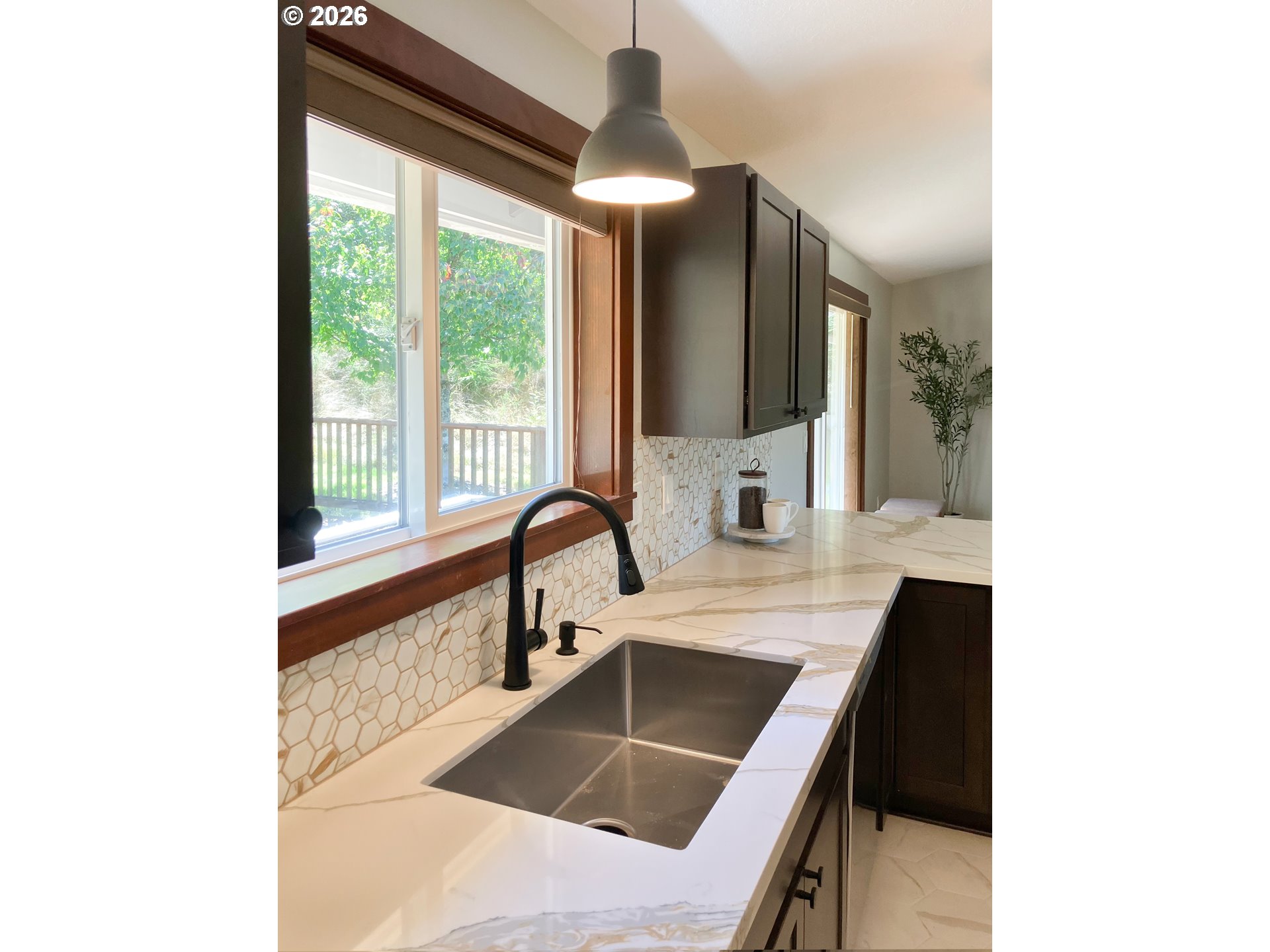 650 Marvin Road Tillamook, OR 97141 - Photo 20 of 48 a kitchen with a sink and a large window
