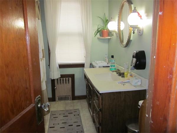 38-40 Palmyra Street Springfield, MA 01118 - Photo 9 of 14 a bathroom with a sink and a mirror