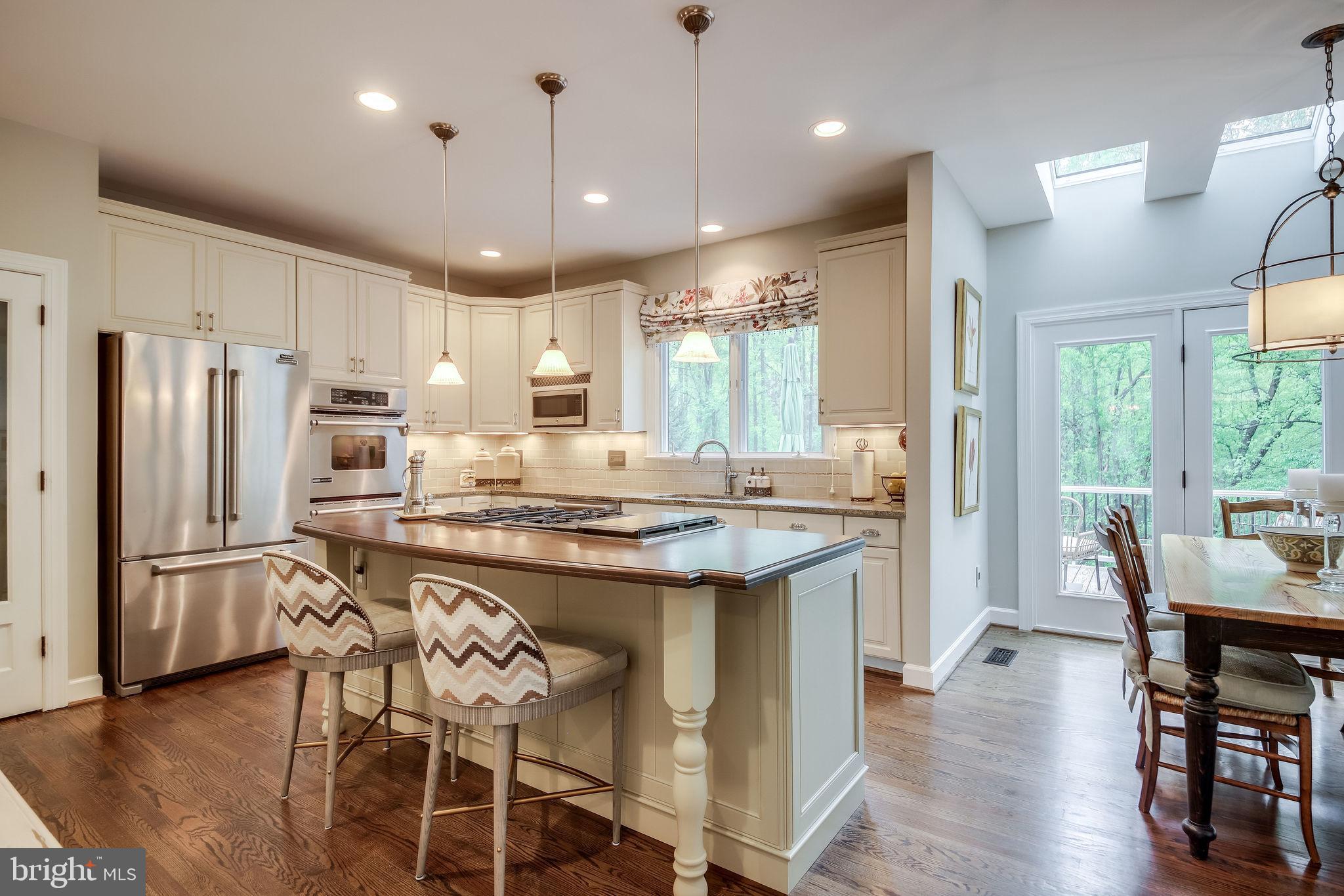 1159 B Fieldview Drive Reston, VA 20194 - Photo 19 of 67 Walnut topped island w/ durable marine varnish