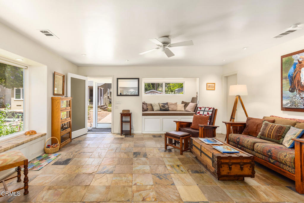 840 Fairview Road Ojai, CA 93023 - Photo 16 of 34 a living room with furniture and a flat screen tv