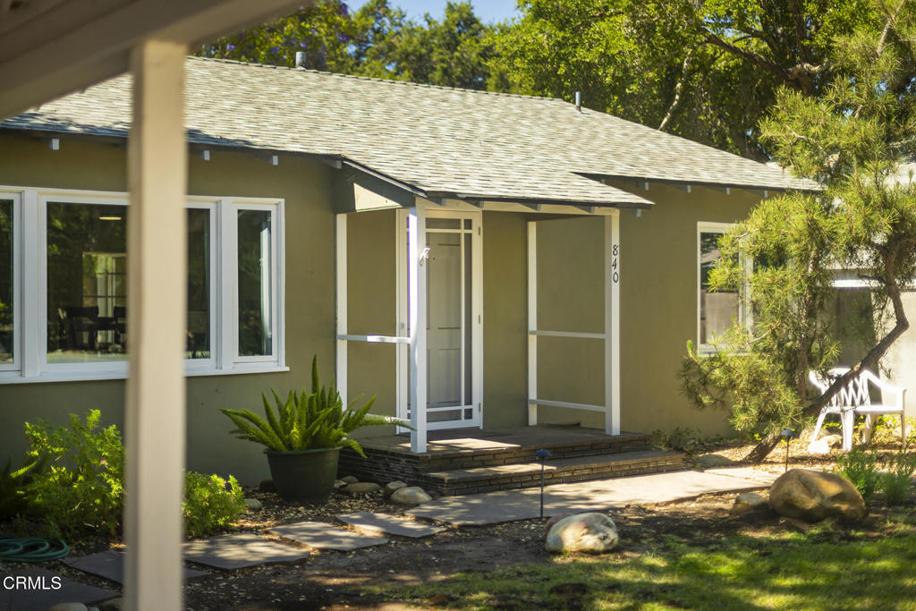 840 Fairview Road Ojai, CA 93023 - Photo 2 of 34 a view of a house with small yard plants and large tree