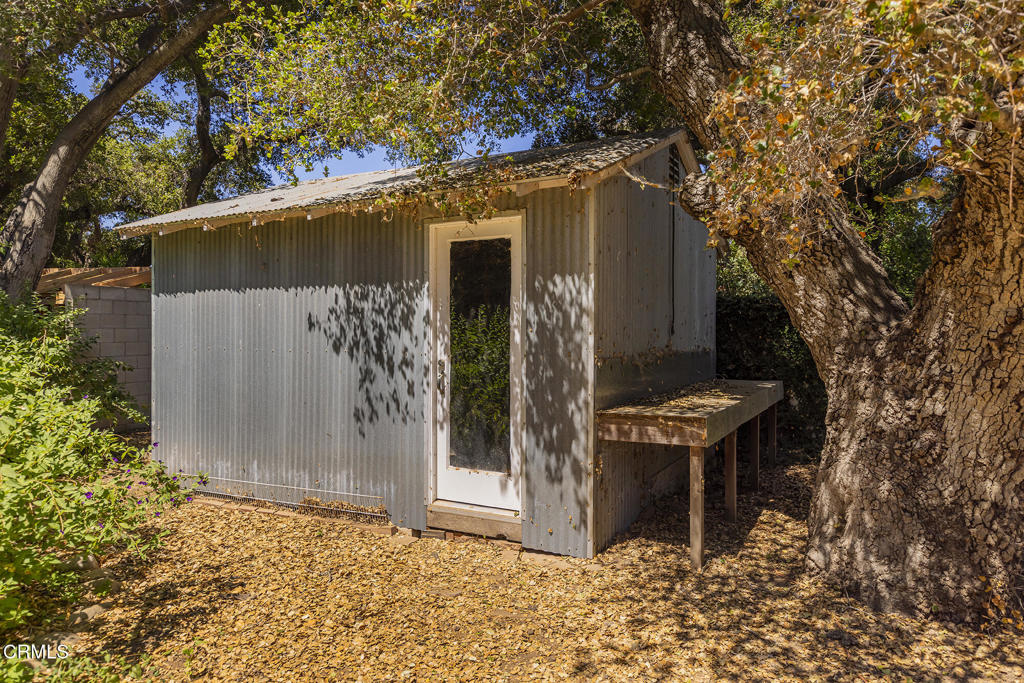 840 Fairview Road Ojai, CA 93023 - Photo 29 of 34 a backyard of a house with table and chairs