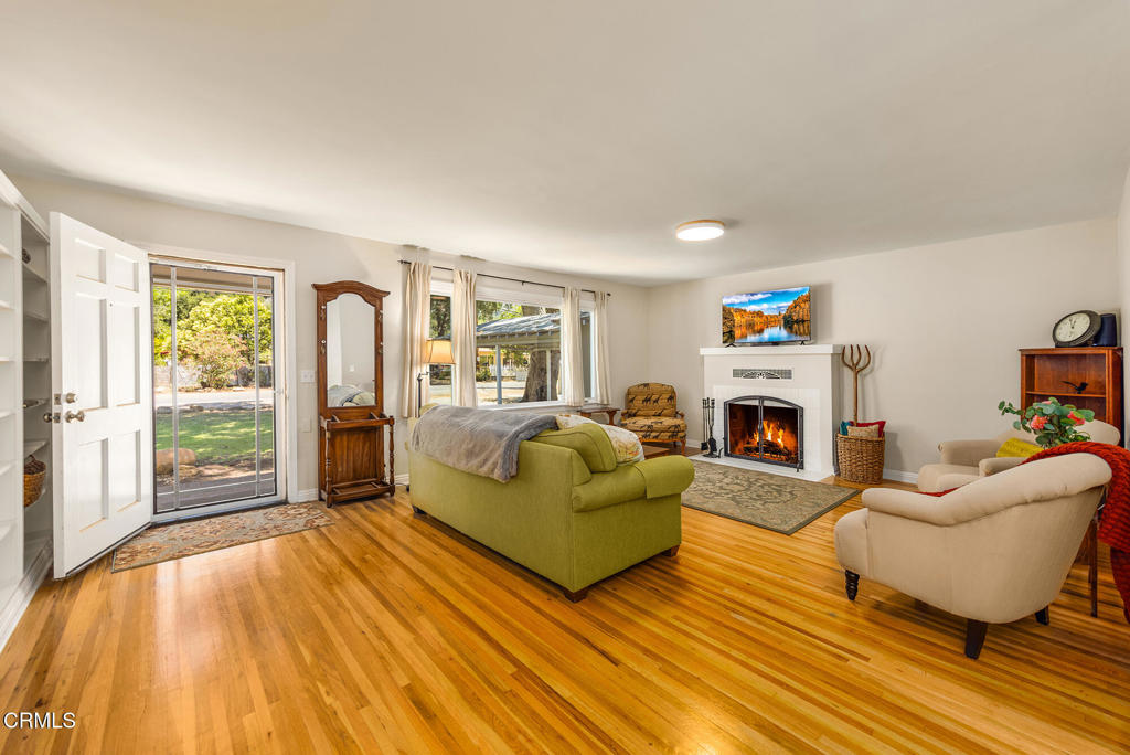 840 Fairview Road Ojai, CA 93023 - Photo 3 of 34 a living room with furniture and a fireplace