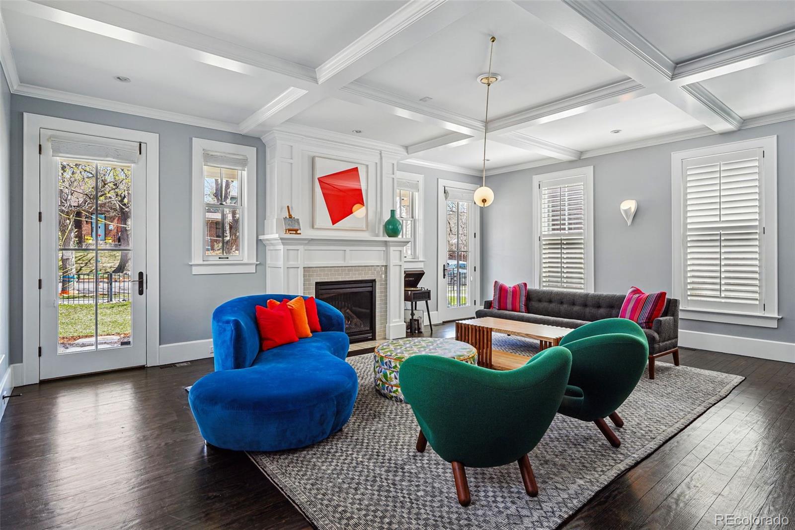 201 South Lafayette Street Denver, CO 80209 - Photo 12 of 48 a living room with furniture and a fireplace