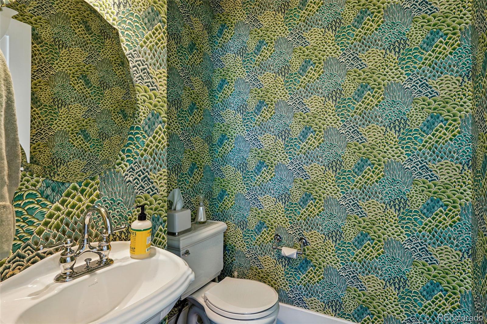 201 South Lafayette Street Denver, CO 80209 - Photo 15 of 48 a bathroom with a toilet and sink