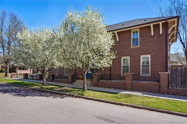 front view of a house with a street