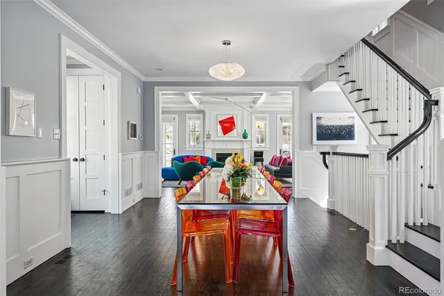 a view of an entryway with wooden floor
