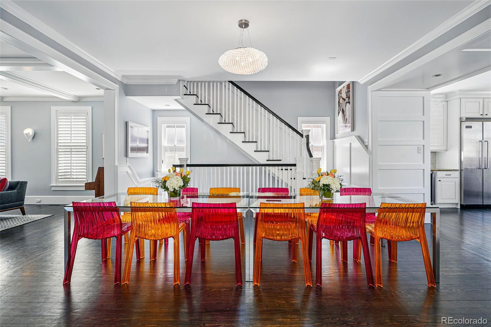 201 South Lafayette Street Denver, CO 80209 - Photo 9 of 48 a view of a dining room with furniture and wooden floor