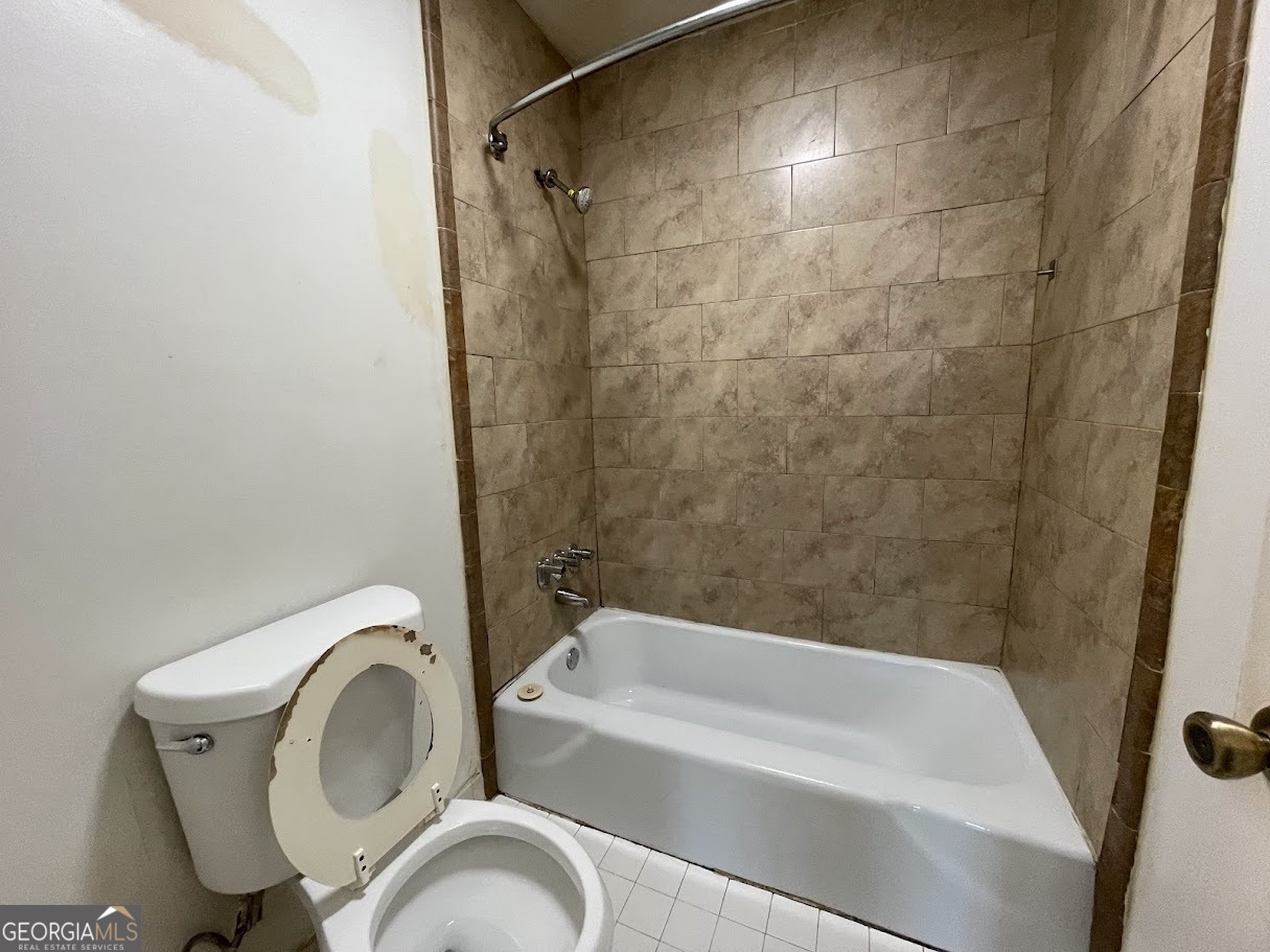 1625 Conley Road, Unit 254 Conley, GA 30288 - Photo 10 of 10 a bathroom with a sink a toilet and bathtub