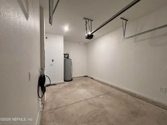 a bathroom with a sink toilet and a mirror