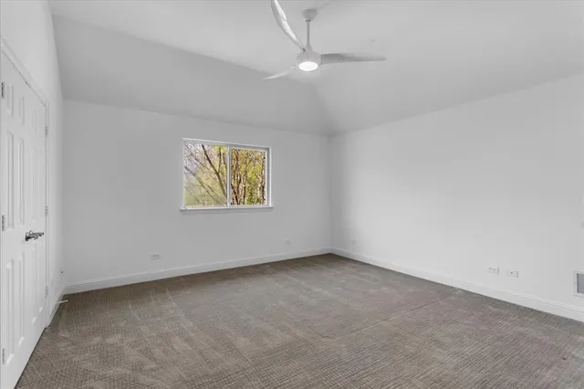 a bathroom with a granite countertop sink a toilet and bathtub