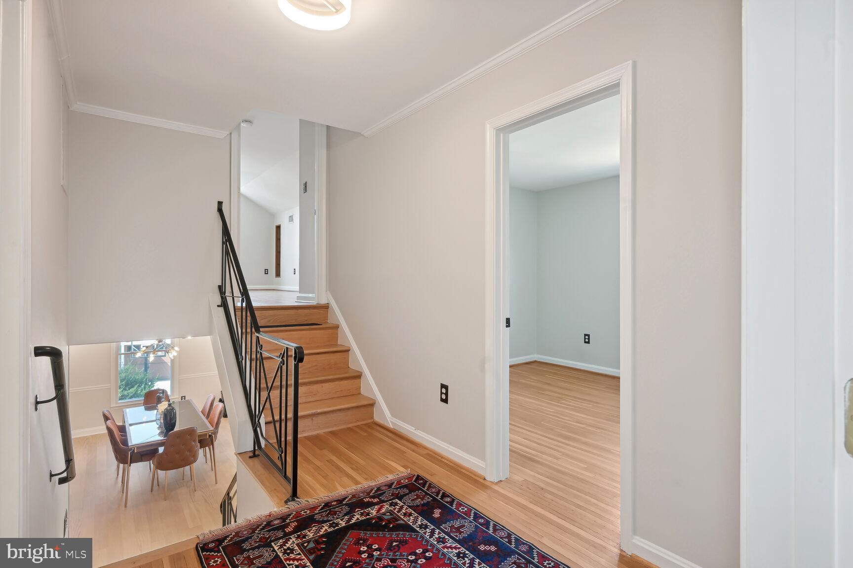 8516 West Howell Road Bethesda, MD 20817 - Photo 5 of 44 Stairs to livingroom