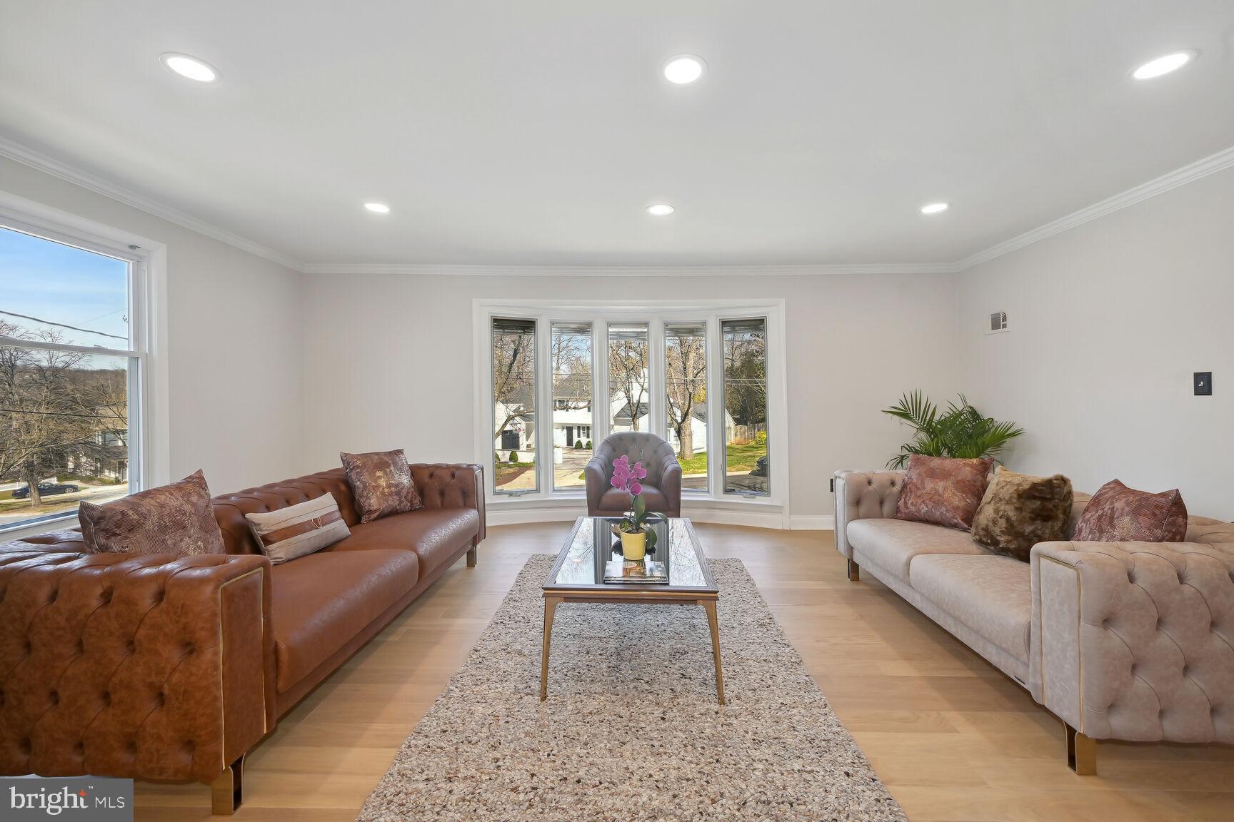 8516 West Howell Road Bethesda, MD 20817 - Photo 9 of 44 Living Room with bay windows