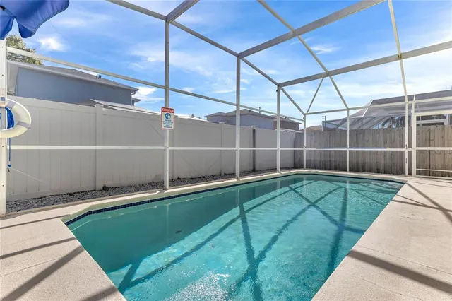 a view of a backyard with a patio