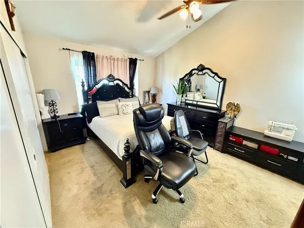 a room with furniture and a mirror