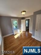 10 Westcott Street Bloomfield, NJ 07003 - Photo 4 of 17 a view of an empty room and window