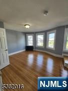 10 Westcott Street Bloomfield, NJ 07003 - Photo 6 of 17 a view of an empty room with window