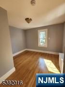 10 Westcott Street Bloomfield, NJ 07003 - Photo 7 of 17 a view of an empty room with a window