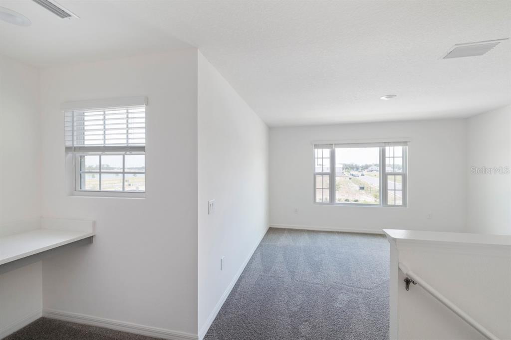5954 Vision Road St. Cloud, FL 34771 - Photo 9 of 15 2nd Floor Family Rm