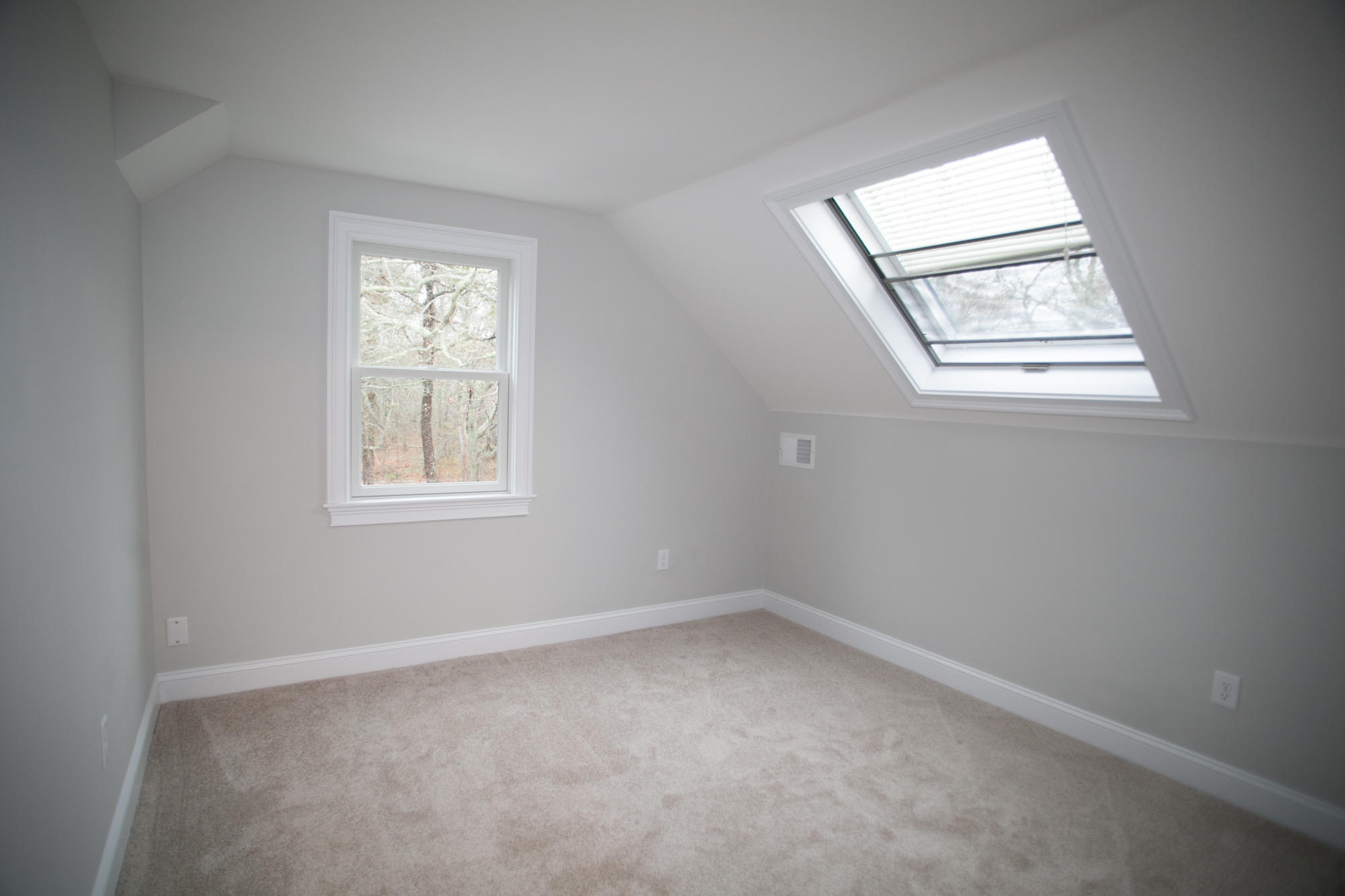 235 Old Craigville Road Hyannis, MA 02601 - Photo 29 of 35 an empty room with windows and mirror