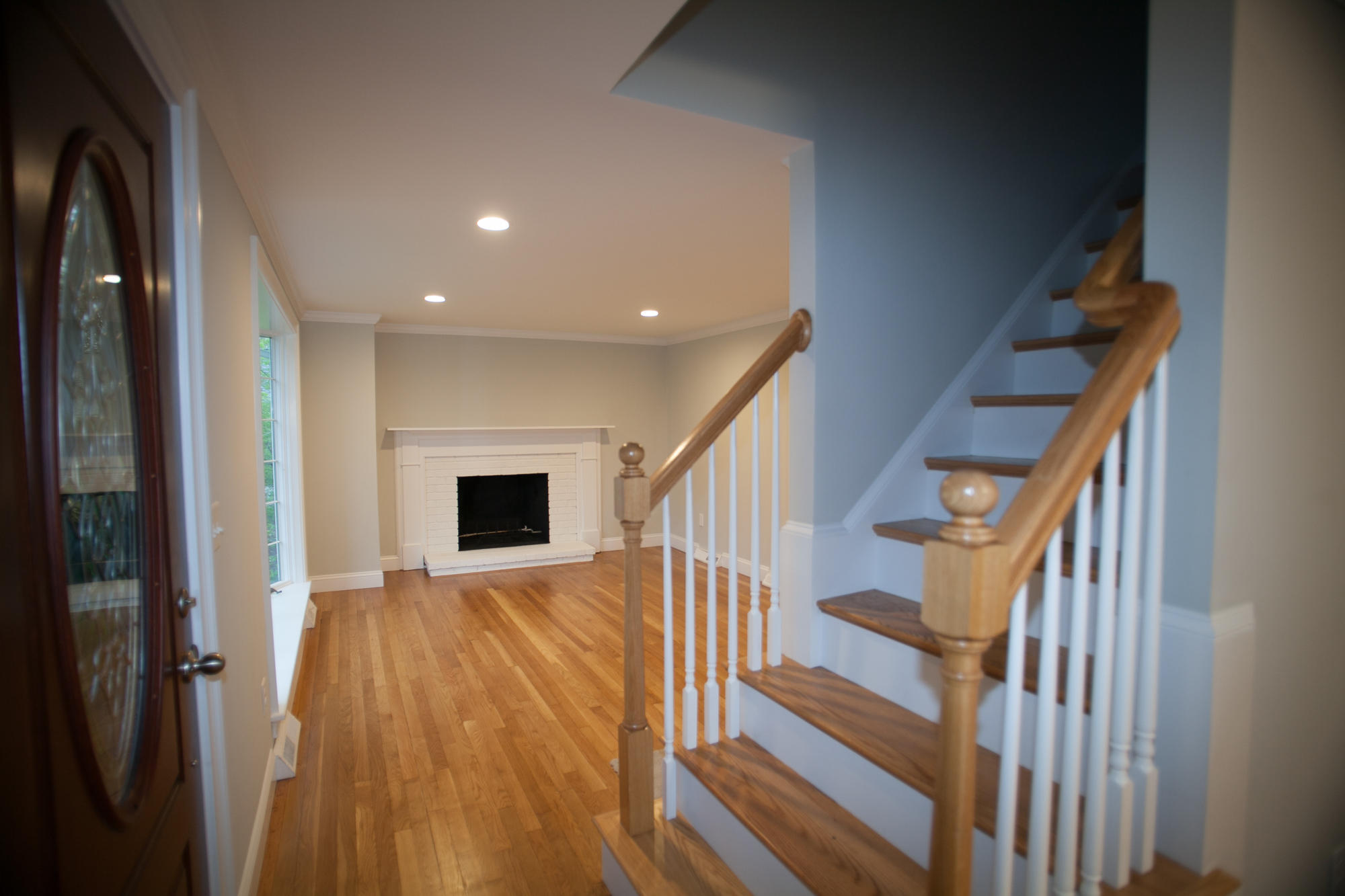 235 Old Craigville Road Hyannis, MA 02601 - Photo 3 of 35 a view of a hallway with wooden floor and staircase