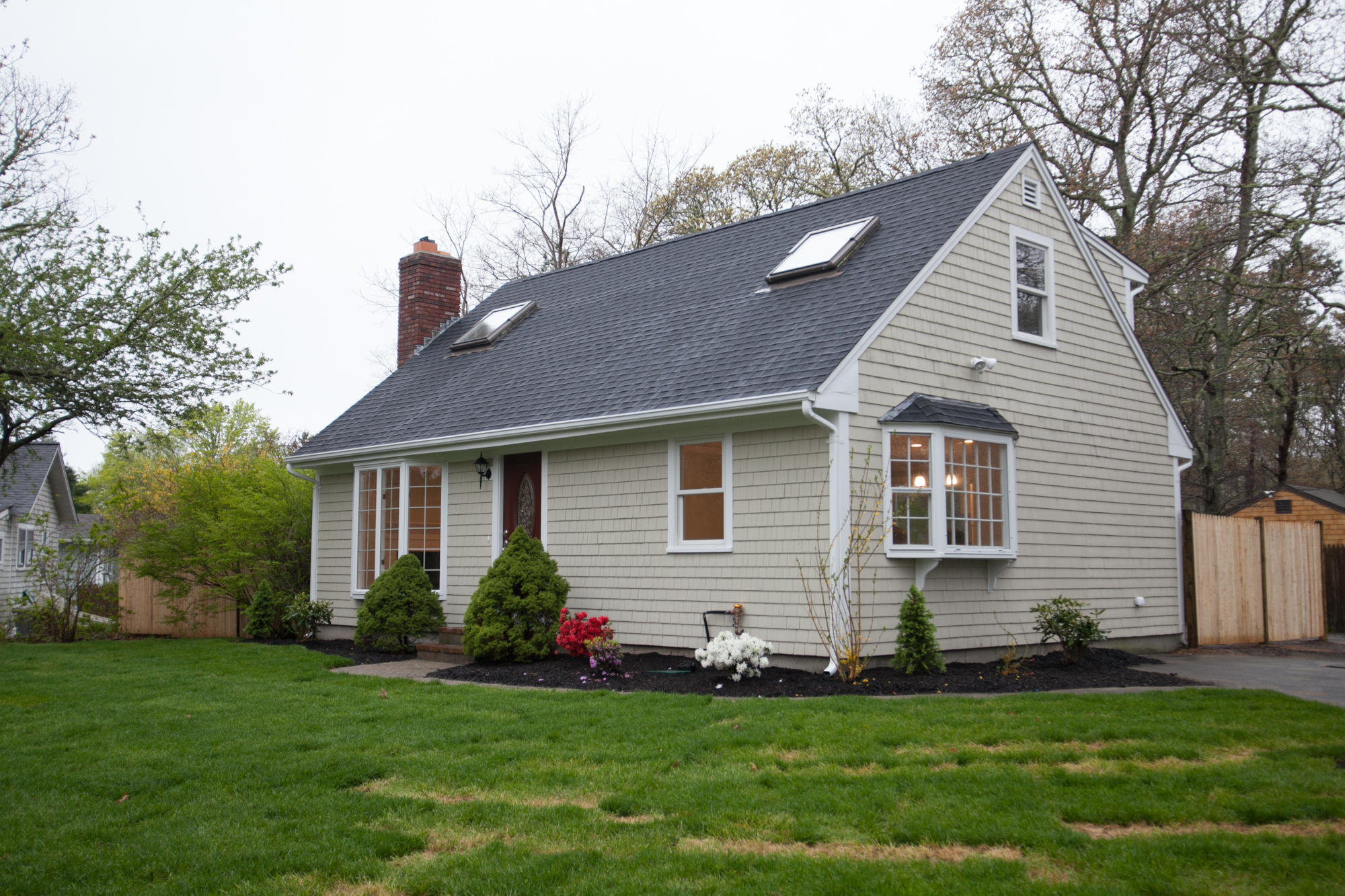 235 Old Craigville Road Hyannis, MA 02601 - Photo 32 of 35 a front view of house with yard and green space