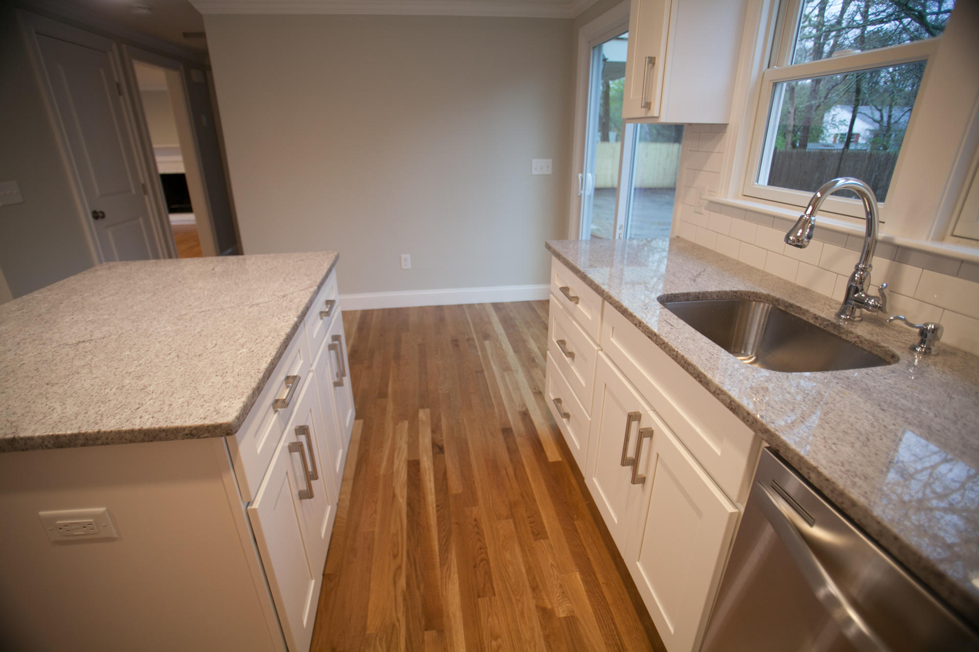 235 Old Craigville Road Hyannis, MA 02601 - Photo 10 of 35 a kitchen with a sink a refrigerator and window