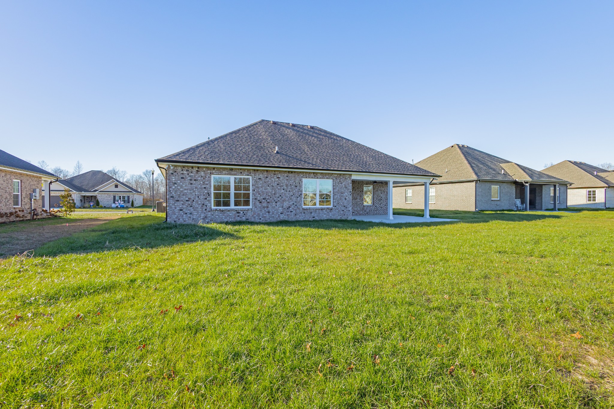 71 Brooklyn Avenue Manchester, TN 37355 - Photo 15 of 69 a front view of a house with garden