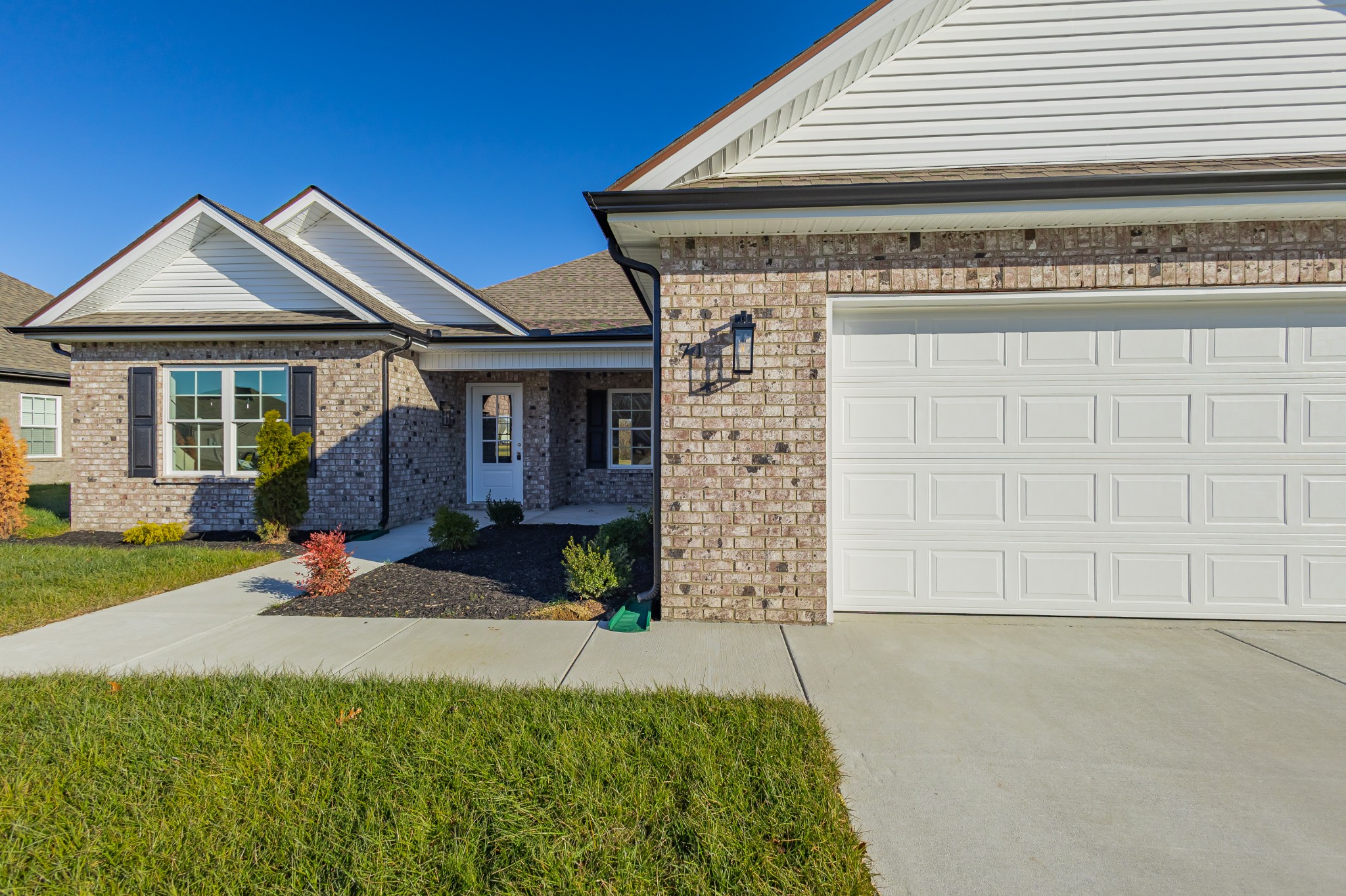 71 Brooklyn Avenue Manchester, TN 37355 - Photo 16 of 69 a front view of a house with a yard