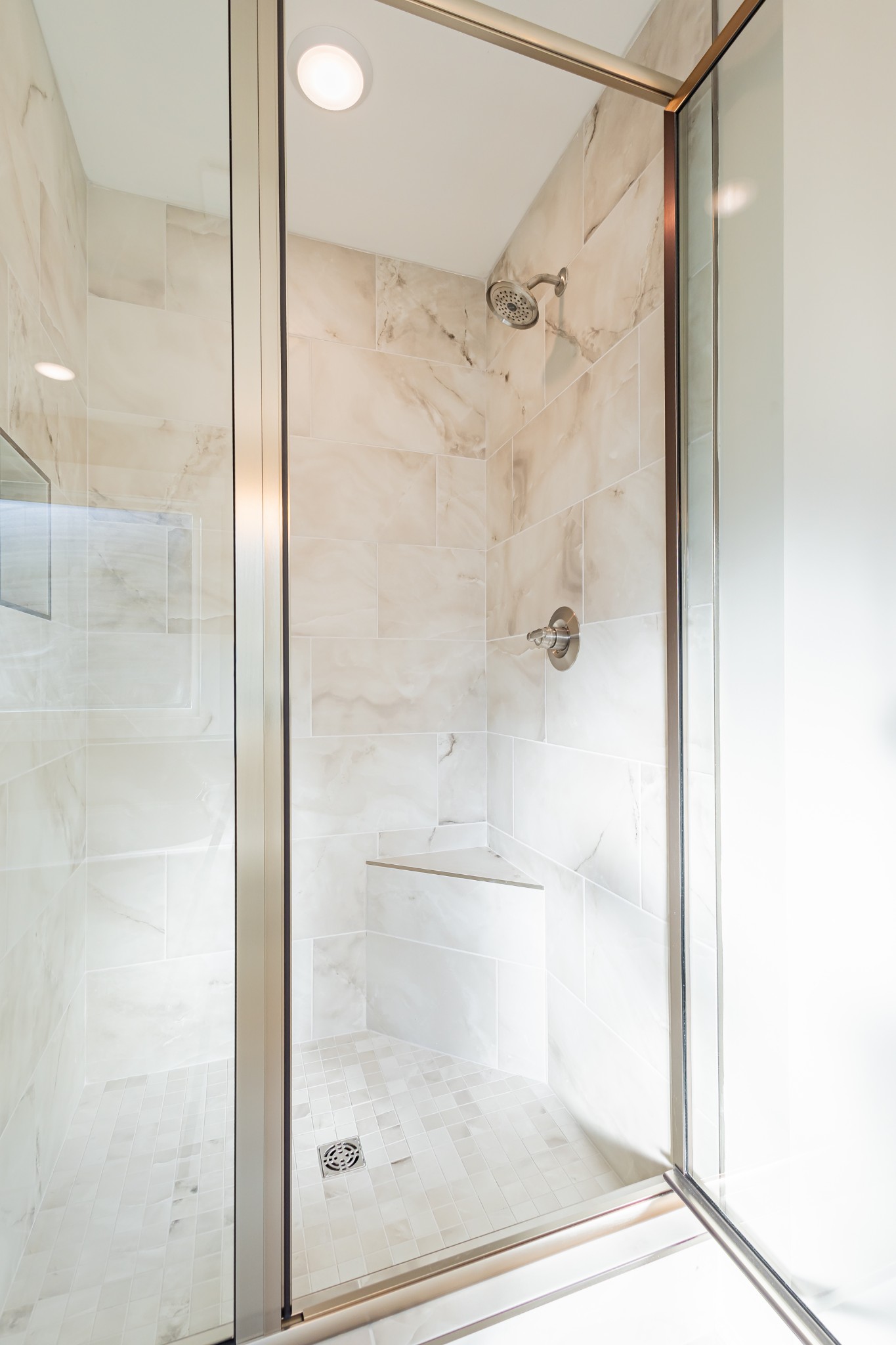 71 Brooklyn Avenue Manchester, TN 37355 - Photo 42 of 69 a bathroom with a glass shower door