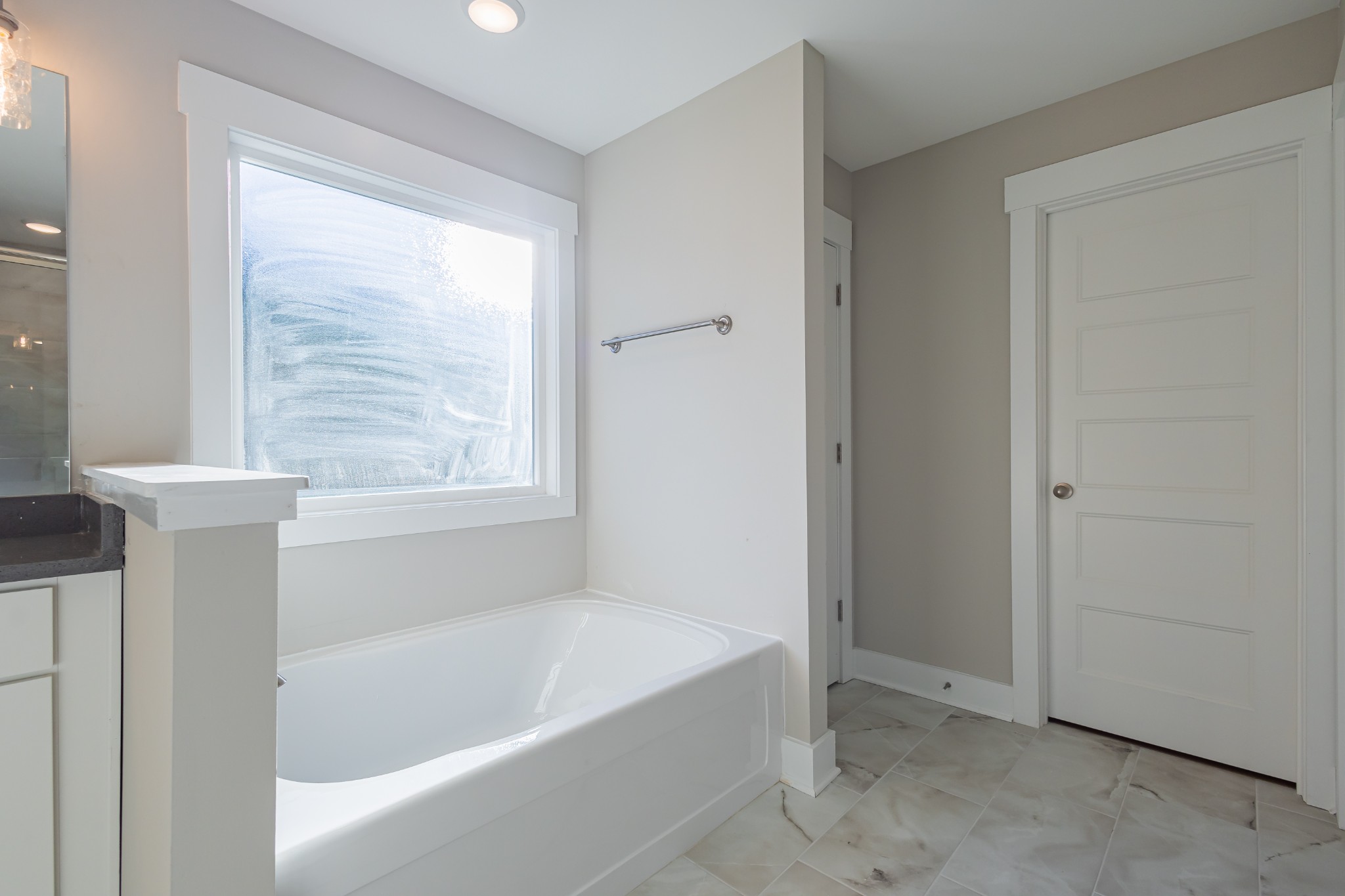 71 Brooklyn Avenue Manchester, TN 37355 - Photo 43 of 69 a white bath tub sitting next to a window