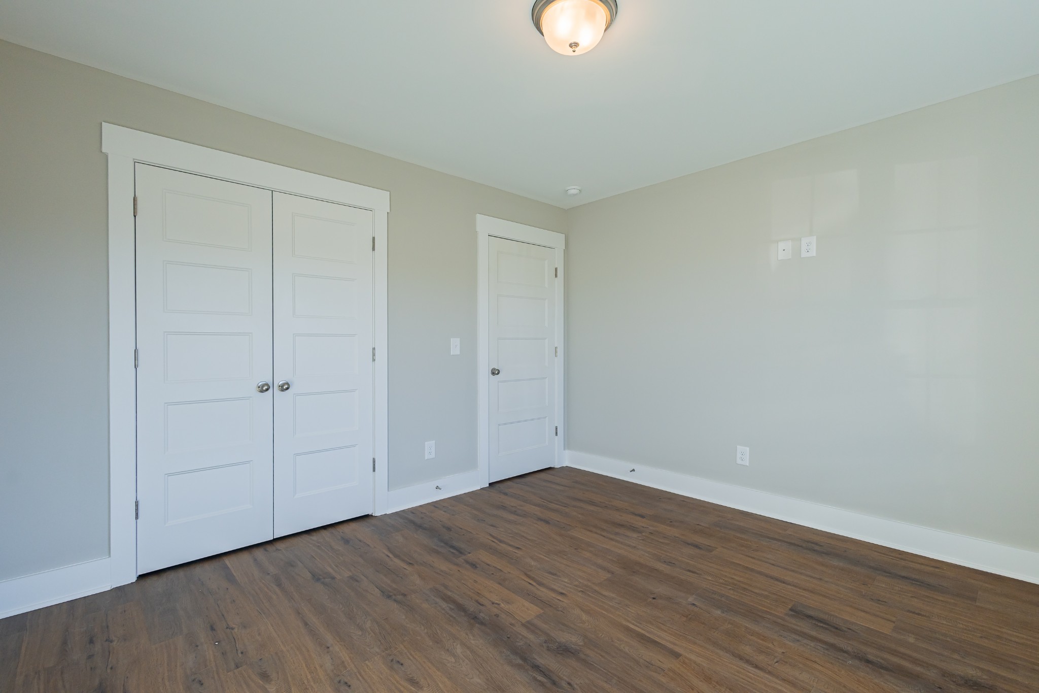 71 Brooklyn Avenue Manchester, TN 37355 - Photo 49 of 69 a view of an empty room with wooden floor