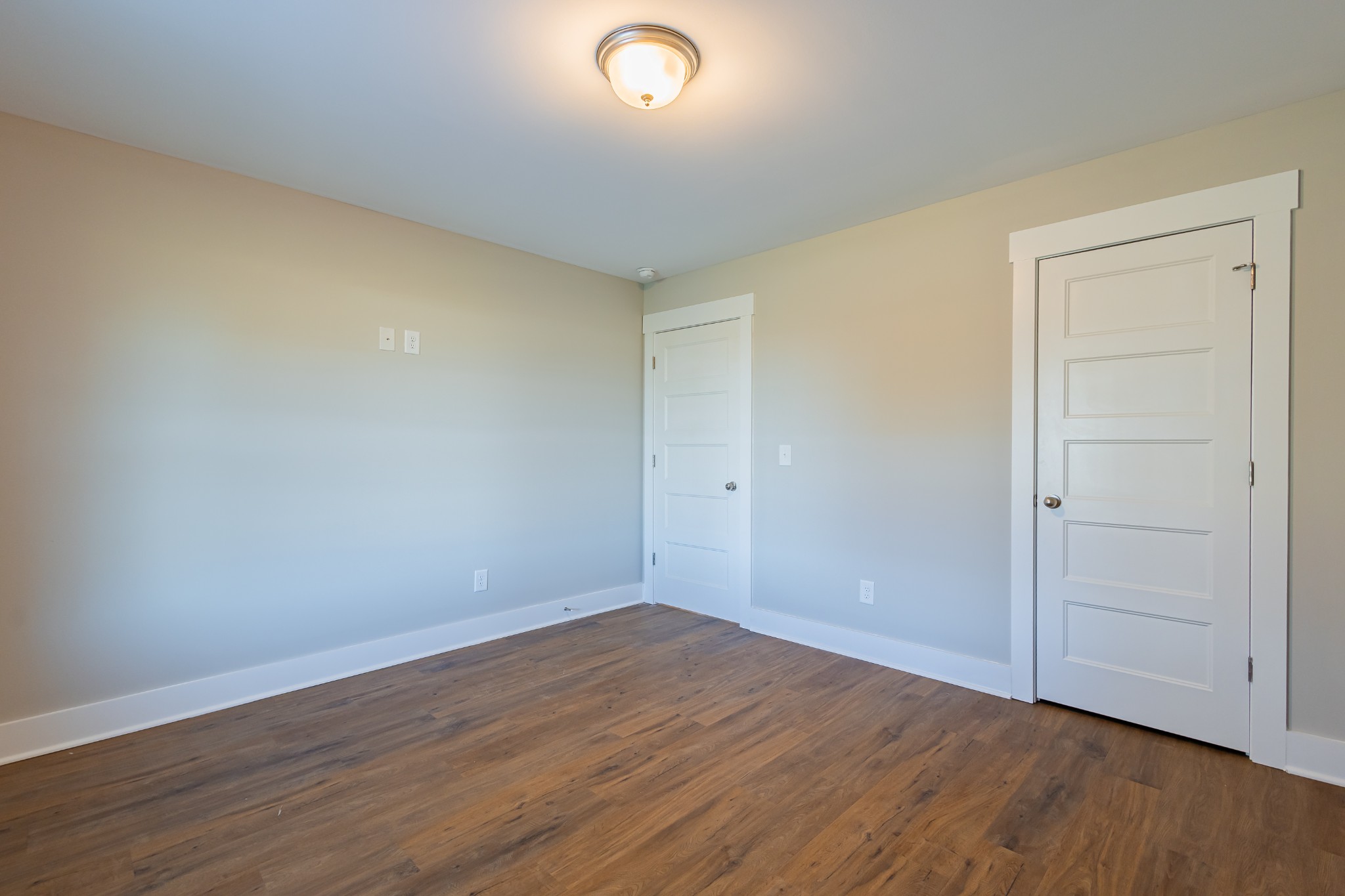 71 Brooklyn Avenue Manchester, TN 37355 - Photo 60 of 69 a view of an empty room with wooden floor