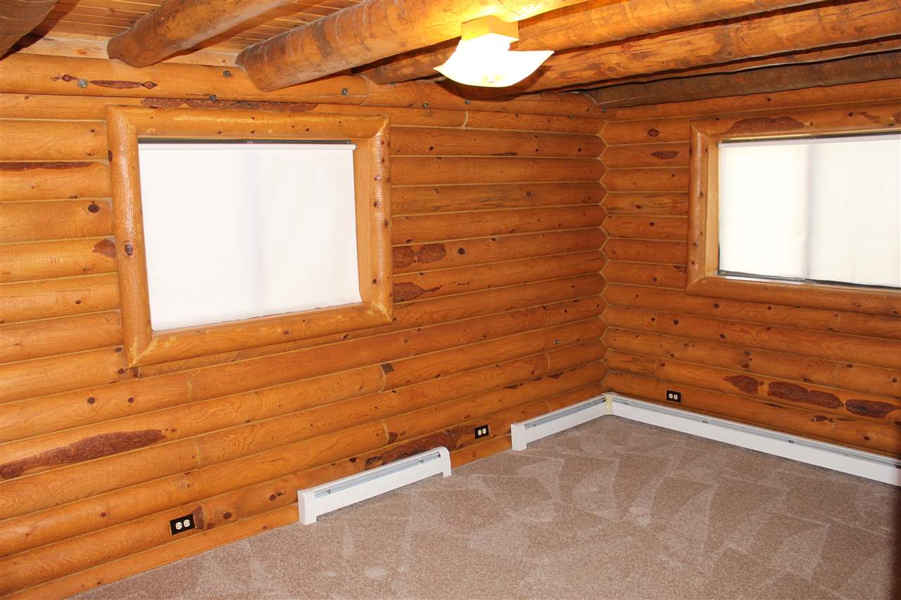 3244 D Road Clifton, CO 81520 - Photo 12 of 21 a view of a small space built with a wooden table and chair