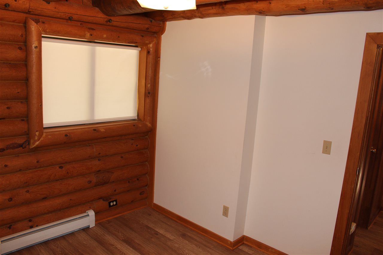 3244 D Road Clifton, CO 81520 - Photo 15 of 21 a view of room with window and wooden floor