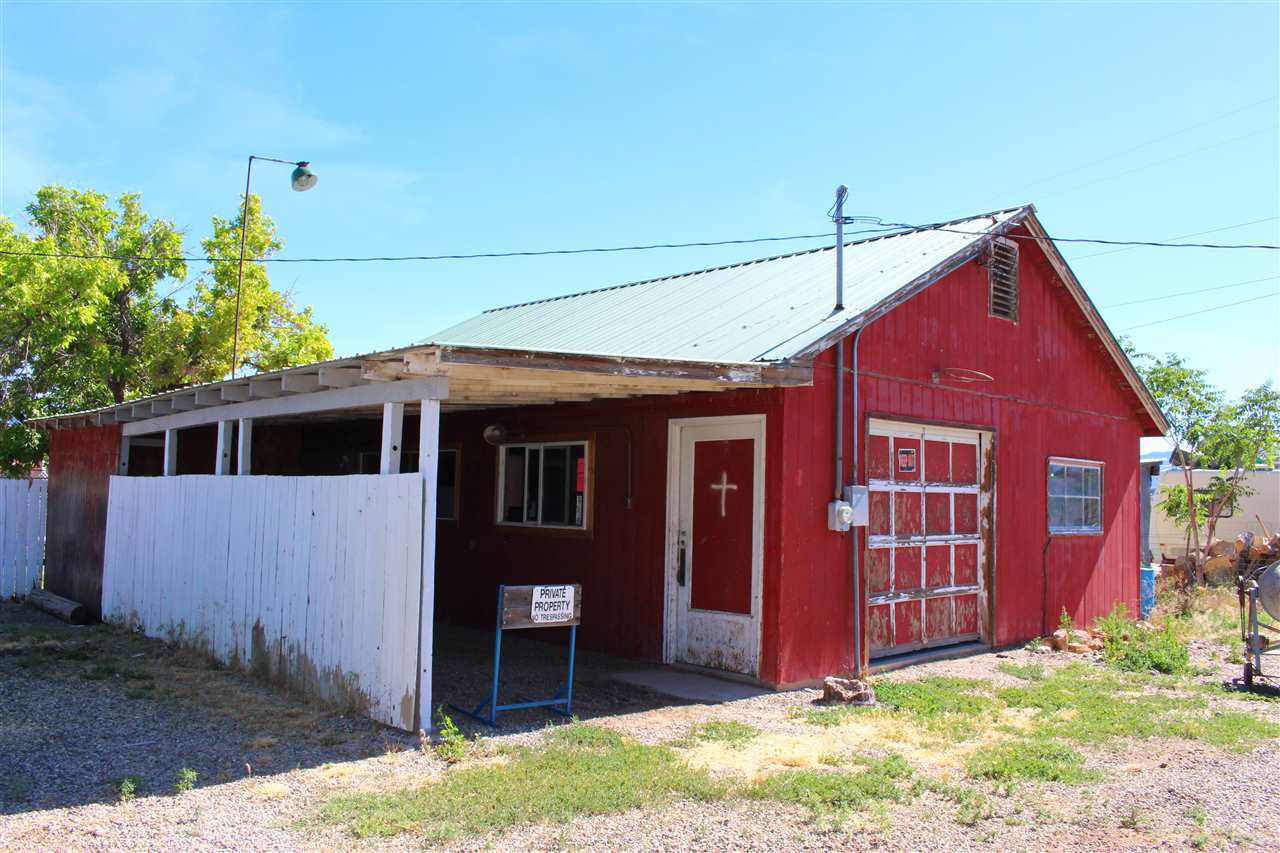 3244 D Road Clifton, CO 81520 - Photo 5 of 21 a front view of a house with garden