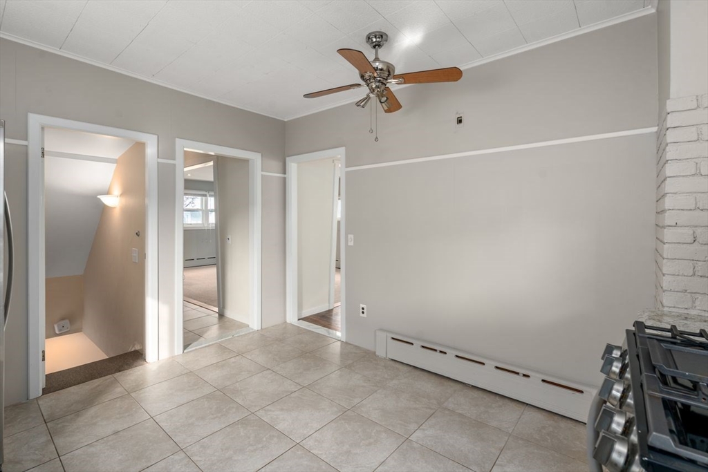960 Shirley Street Winthrop, MA 02152 - Photo 14 of 38 an empty room with closet and a chandelier fan